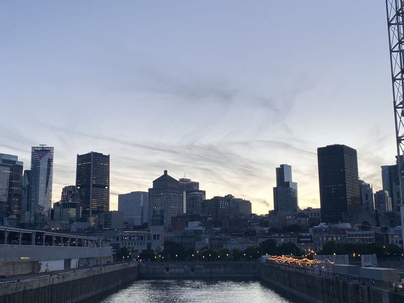 The Montreal skyline at dusk, seen from the St. Lawrence River
